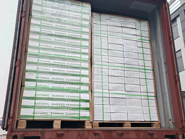 Direct factory loading of bamboo flooring into shipping container for overseas export